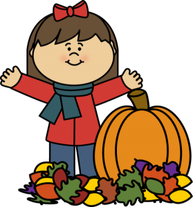 a girl with autumn pumpkin